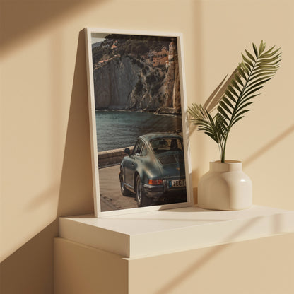 Angled shelf display of Menaggio mountains Porsche poster