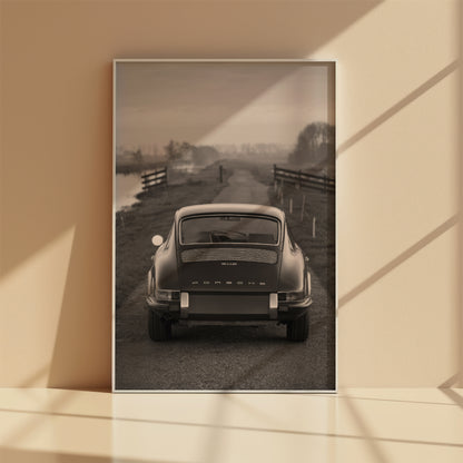 Black and white Porsche poster featuring London river backdrop